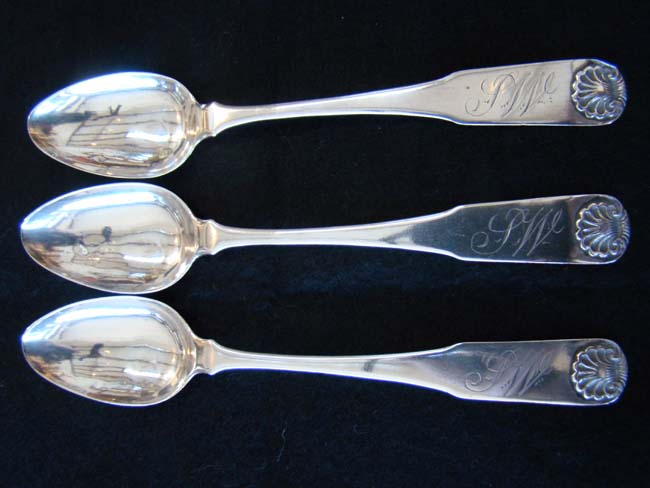 A set of three Coin Silver Teaspoons with scallop shell ends by Shepherd & Boyd of Albany, N.Y., circa 1810.